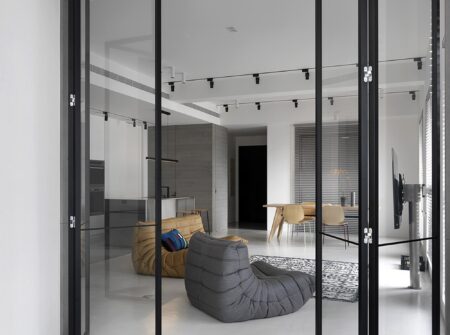 modern apartment with glass room divider