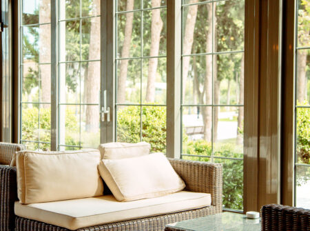 outdoor sofa with beige cushions