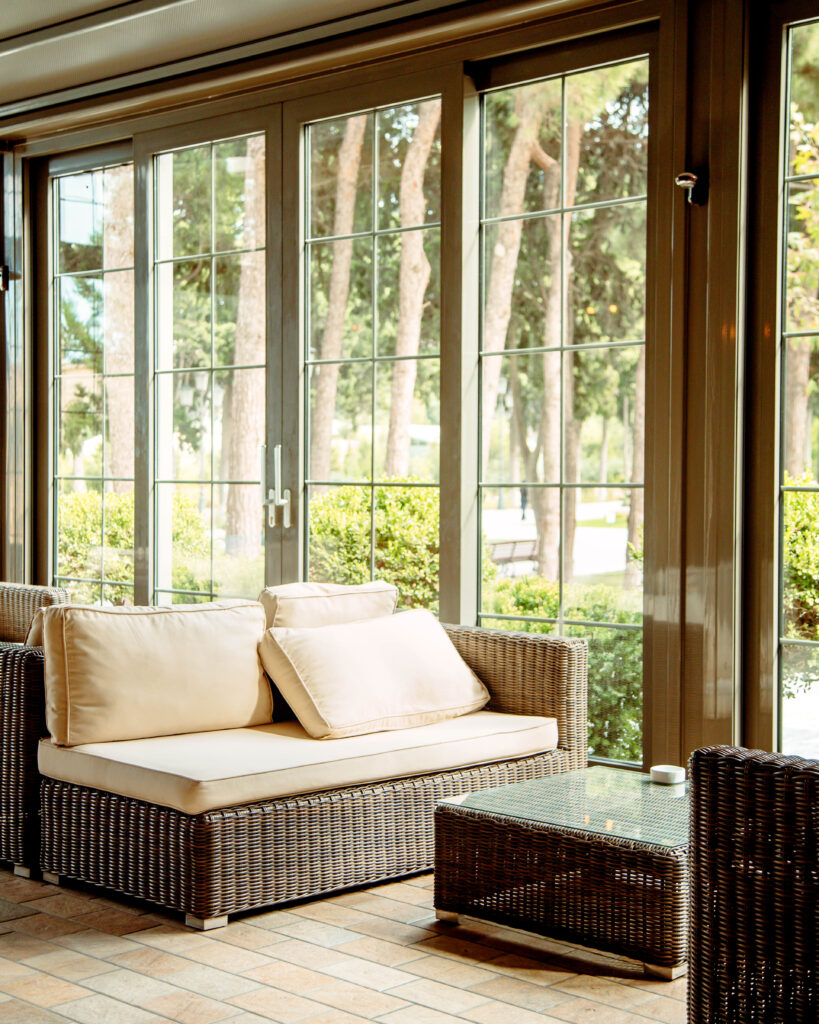 outdoor sofa with beige cushions