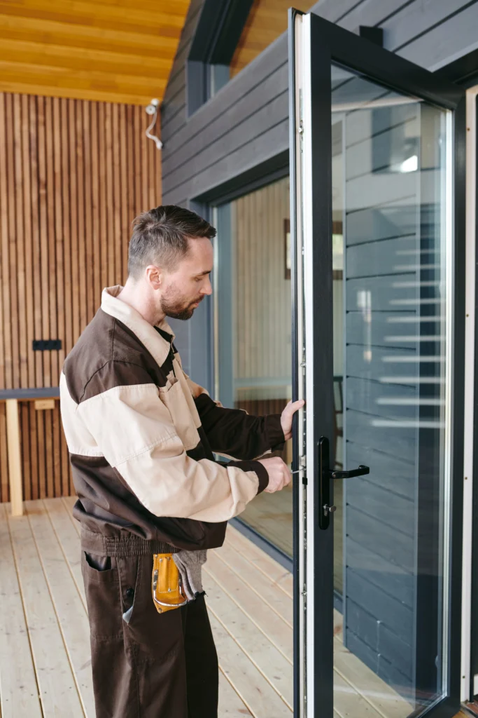 young repairman standing front g